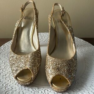 Good condition Stuart Weitzman 8 1/2M Gold Sparkle 5 inch heels
